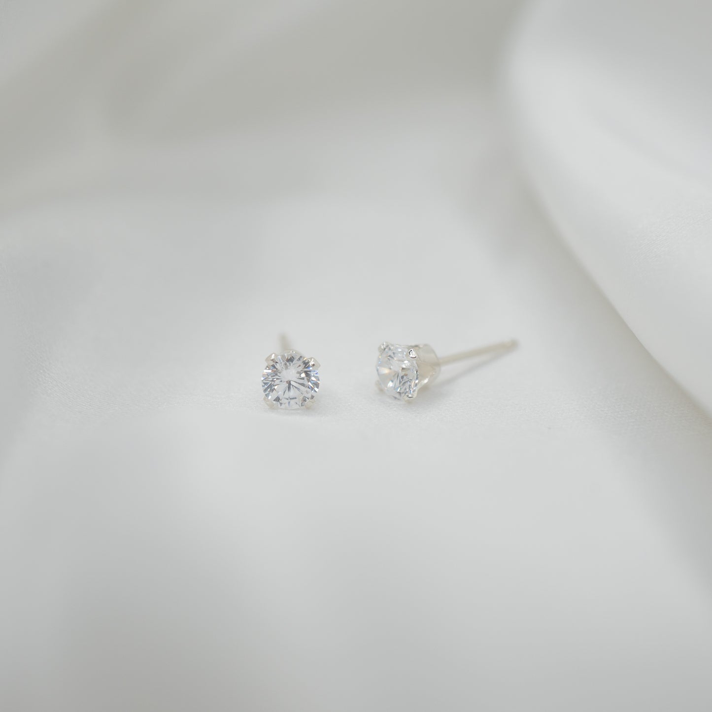 Sterling Silver Cubic Zirconia Studs - Various Sizes - front view - clear 4mm