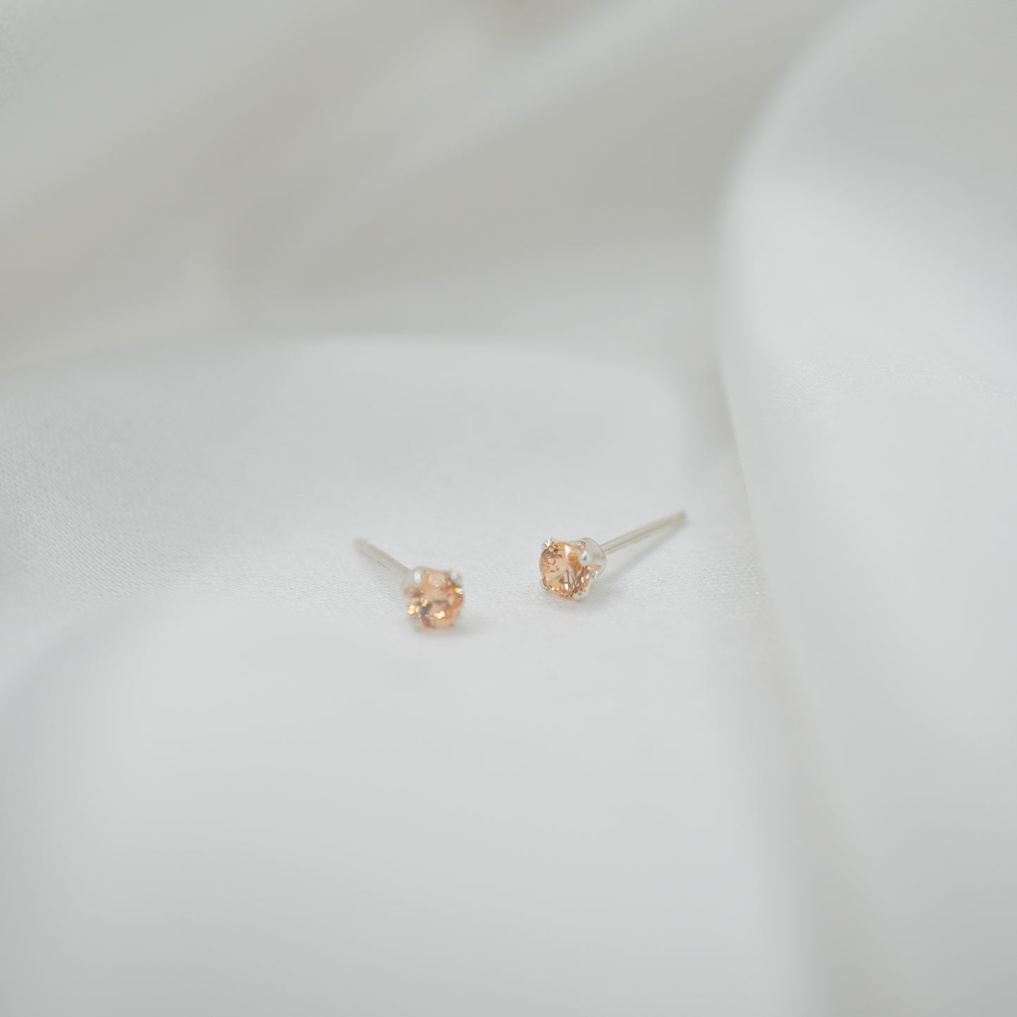 Sterling Silver Cubic Zirconia Studs - Various Sizes - front view - apricot 3mm