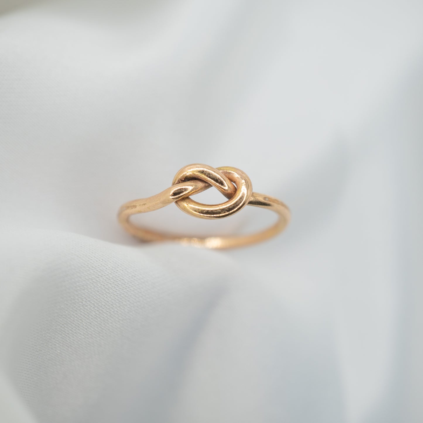 Gold Filled Knot Ring - shot on white - aerial view