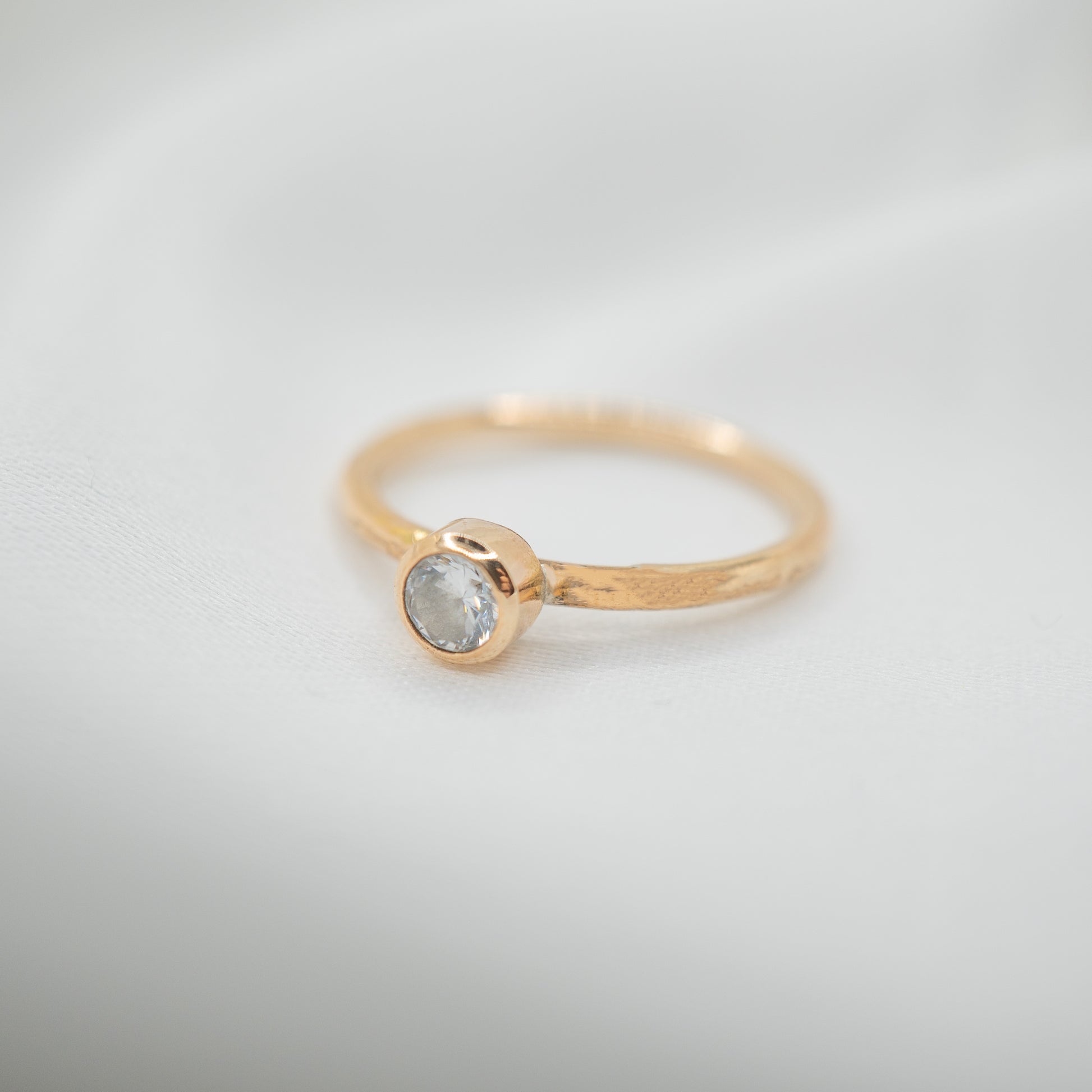 Gold Filled Cubic Zirconia Tube Ring - shot on white - left side view