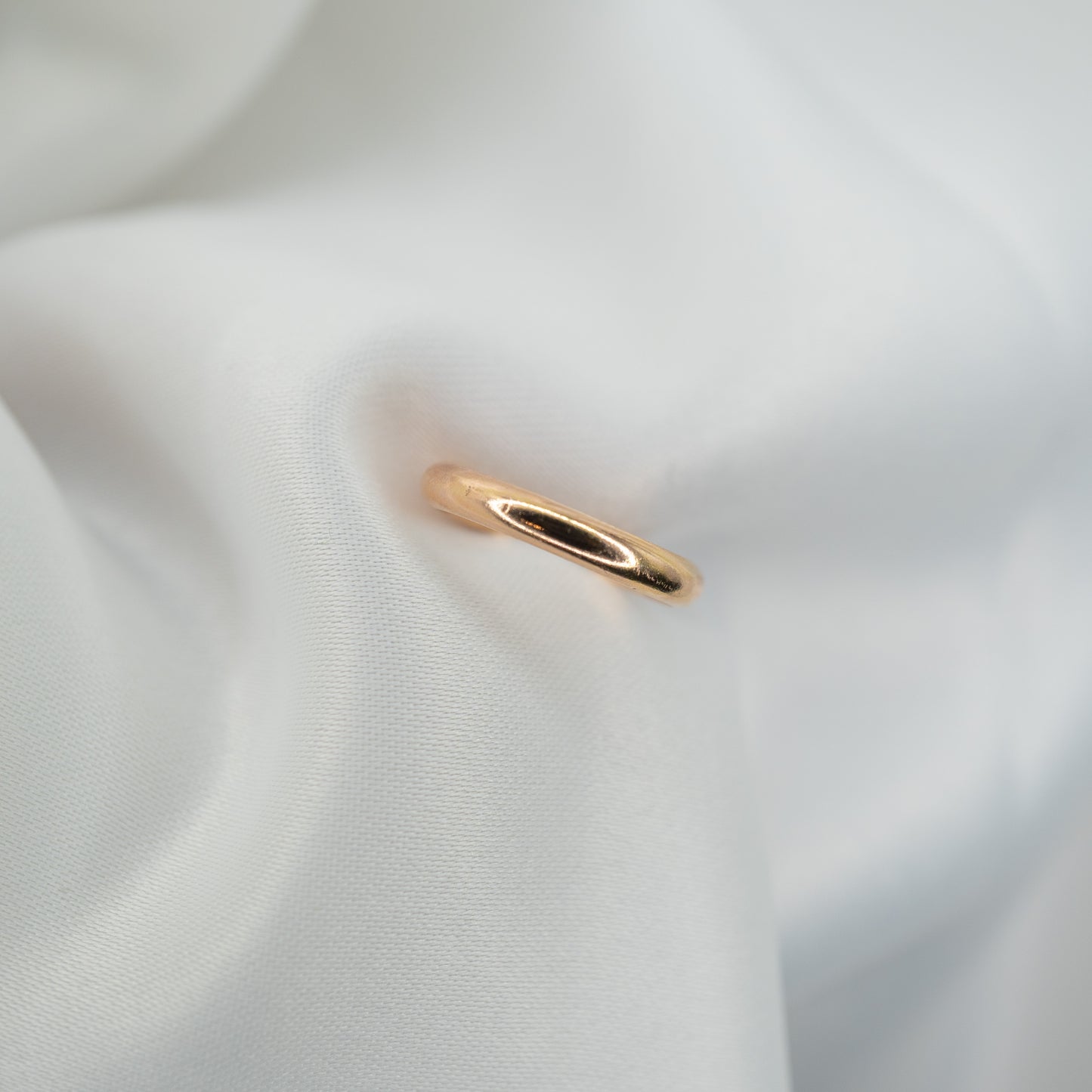 Gold Filled Plain Band Ring - shot on white - aerial view