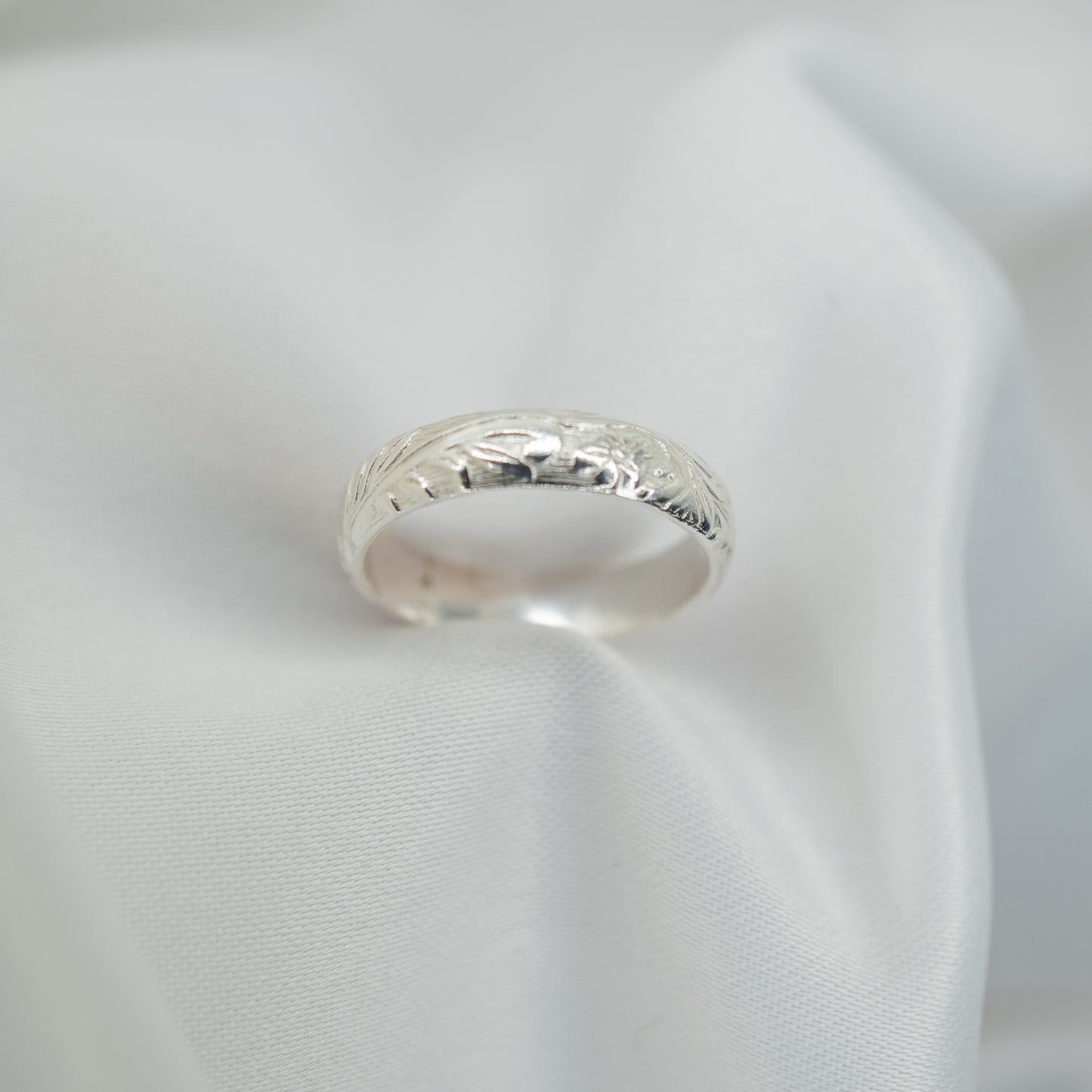 Sterling Silver Vintage Pattern Ring - shot on white - aerial shot