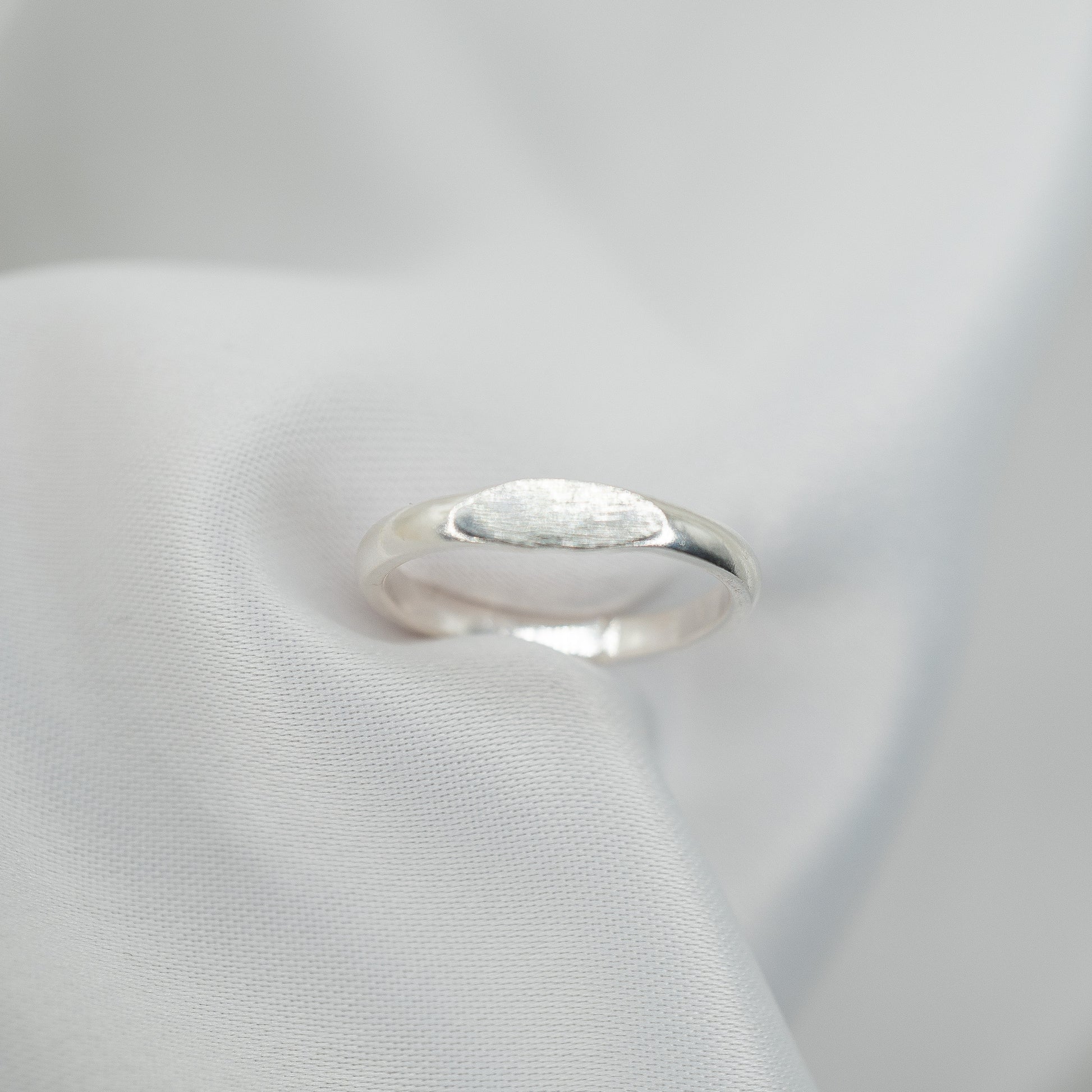 Sterling Silver Mini Signet Ring - shot on white - aerial view