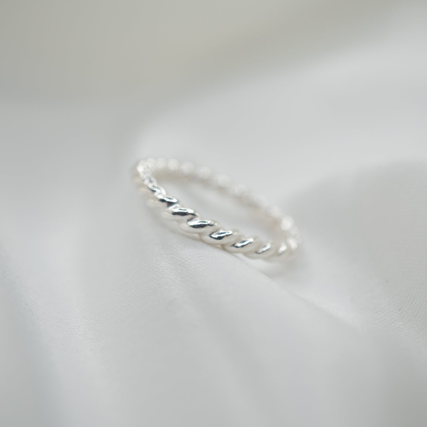 Sterling Silver Twisted Ring - shot on white - side view