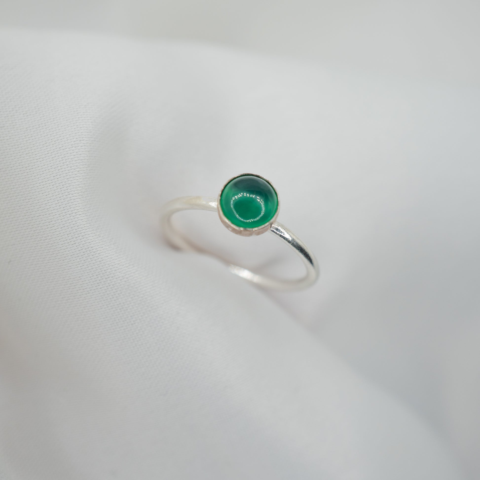 Sterling Silver Green Onyx Cabochon Ring - shot on white - upwards view