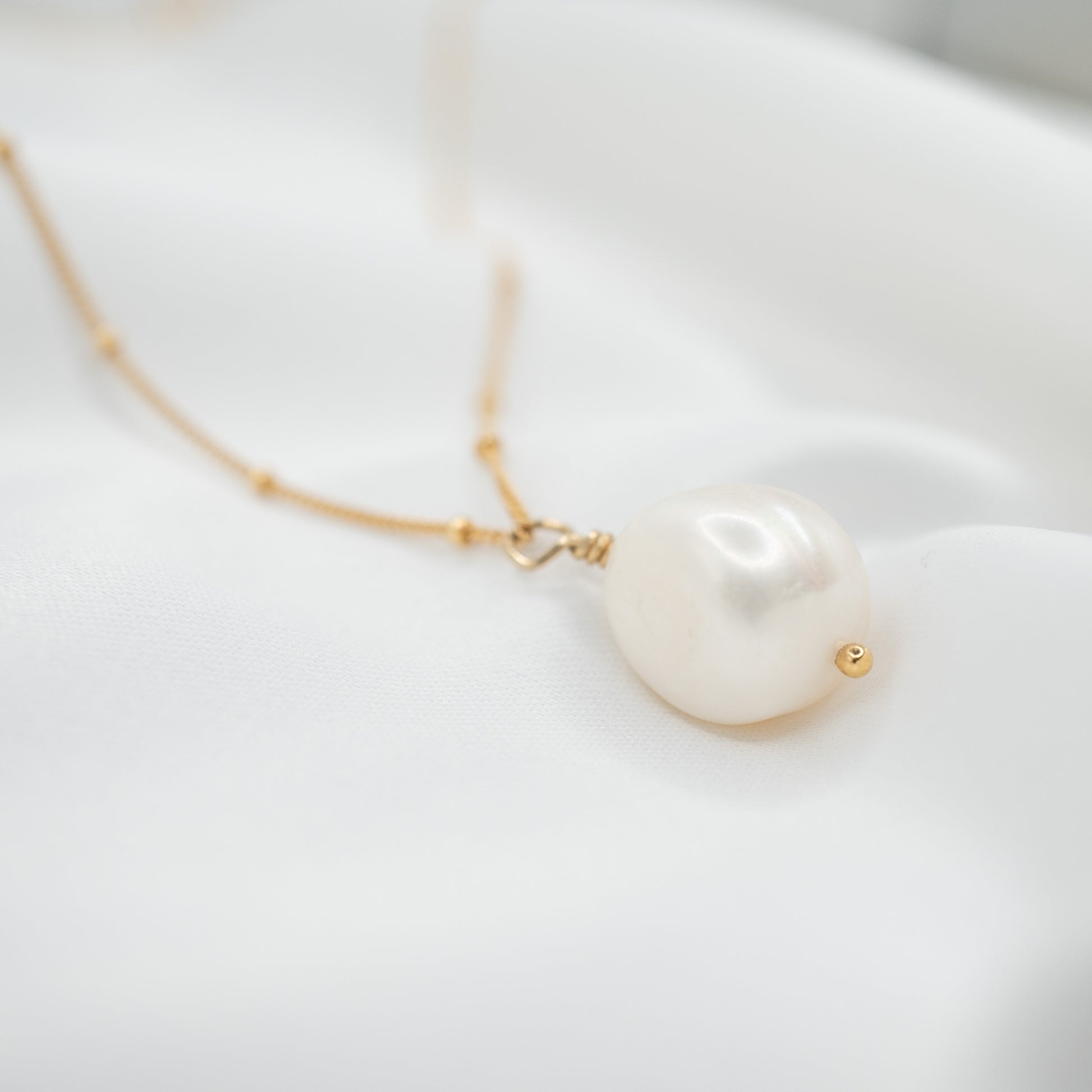 Gold Filled Baroque Pearl Pendant and Satellite Necklace - shot on white - close up