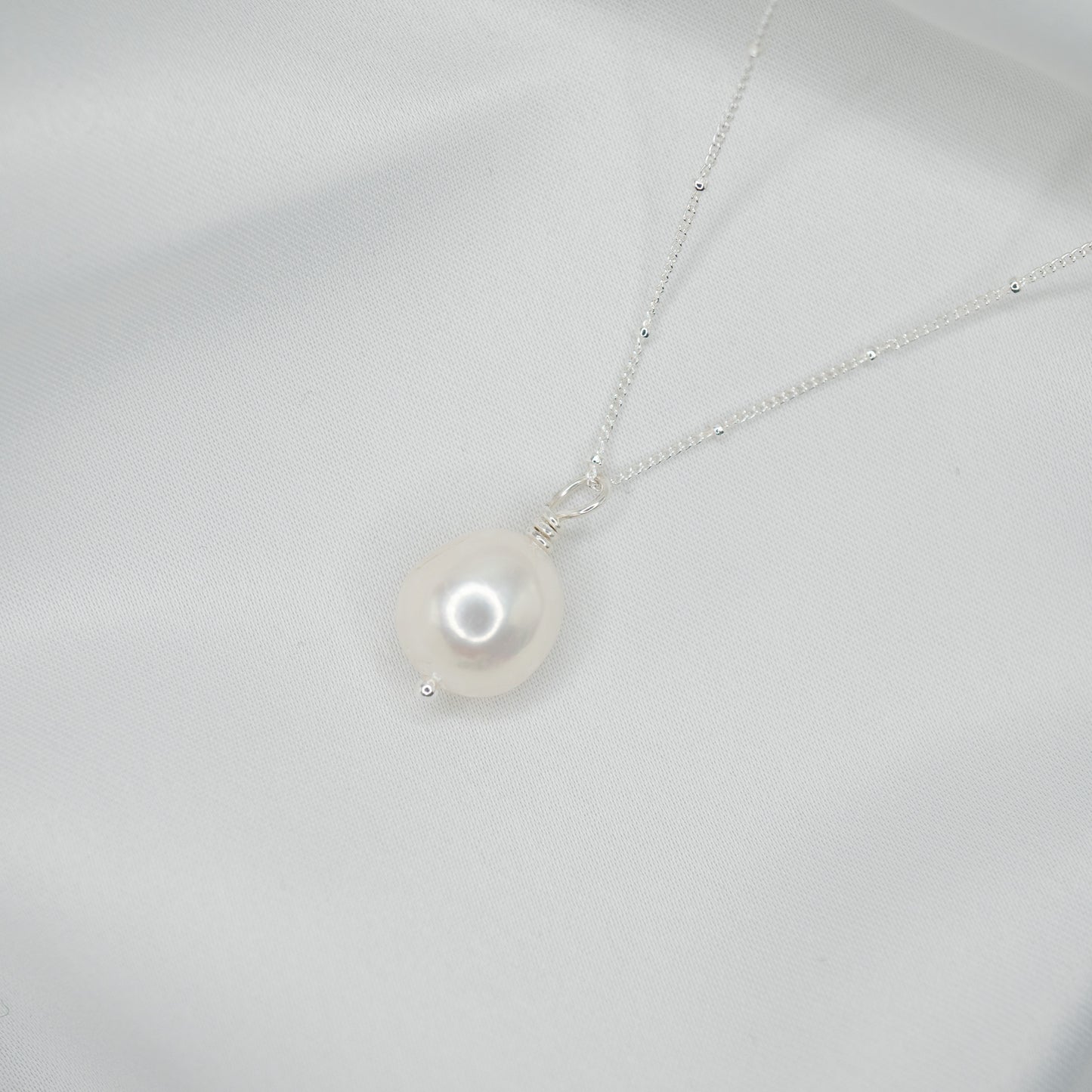 Sterling Silver Baroque Pearl Pendant and Satellite Necklace - shot on white - side left