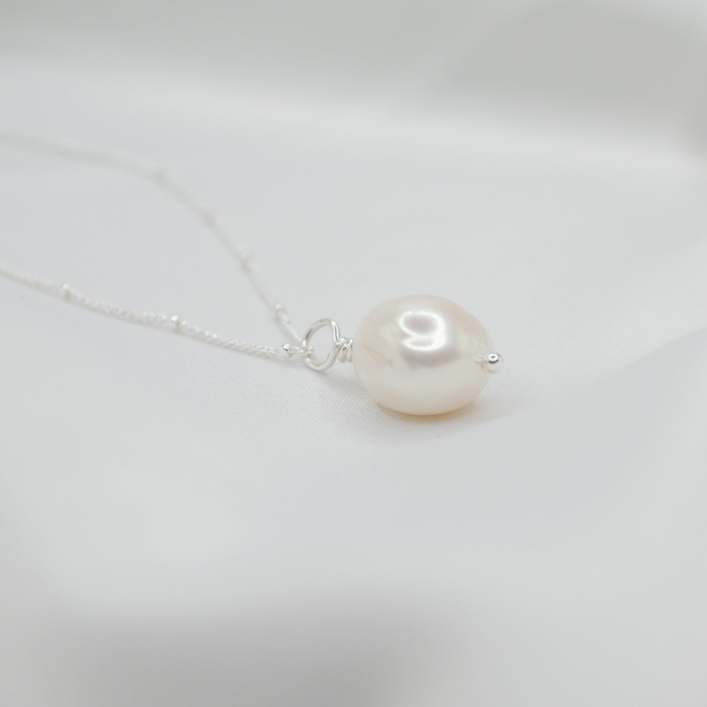 Sterling Silver Baroque Pearl Pendant and Satellite Necklace - shot on white - side right